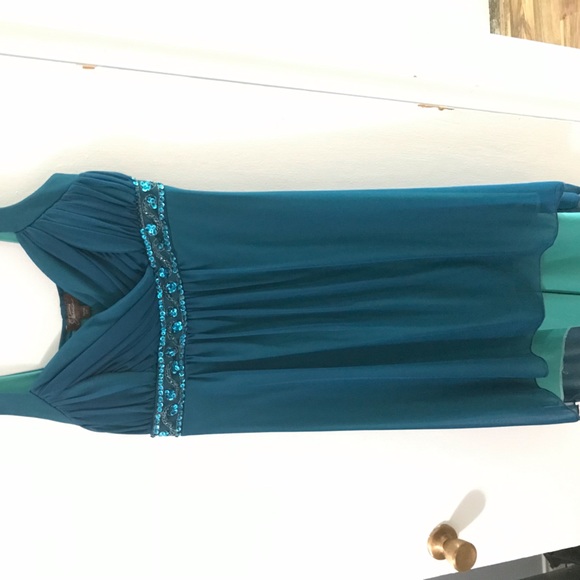 Petite size 12 but will fit a buster individual don’t worry. - Picture 1 of 2